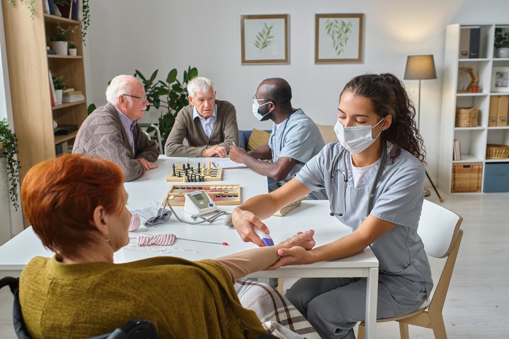 Medical provider and patients at respite care facility in Erie, PA