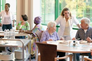 Residents and care providers at a skilled nursing facility